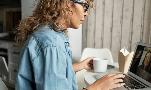 Woman having a meeting on computer