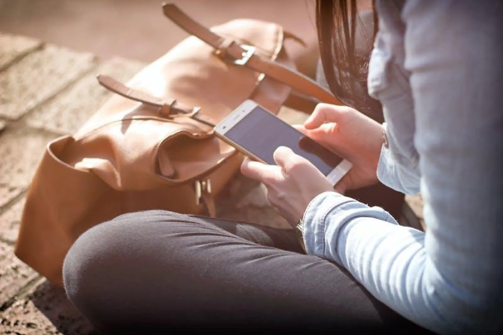 woman looking at phone